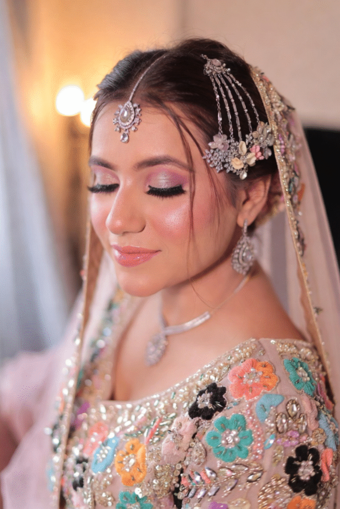 Fusion bride with nude-pink lips and mixed-style glam.